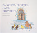 På svømmeføtter over brostein